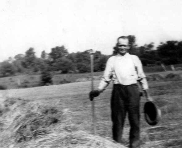 Frank Searles in 1944 pitching hay